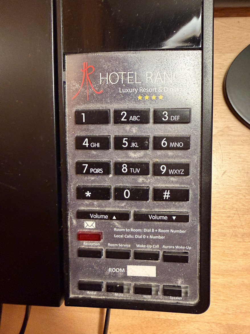 Telephone with aurora wake-up button